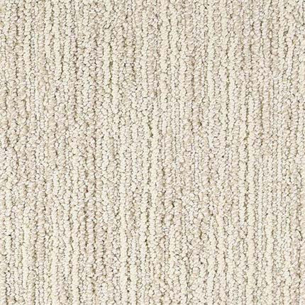 Close-up of Advocate Berber Carpet in Windfall, featuring a beige textured looped pile with subtle vertical lines for a soft, neutral look that's both stylish and durable.
