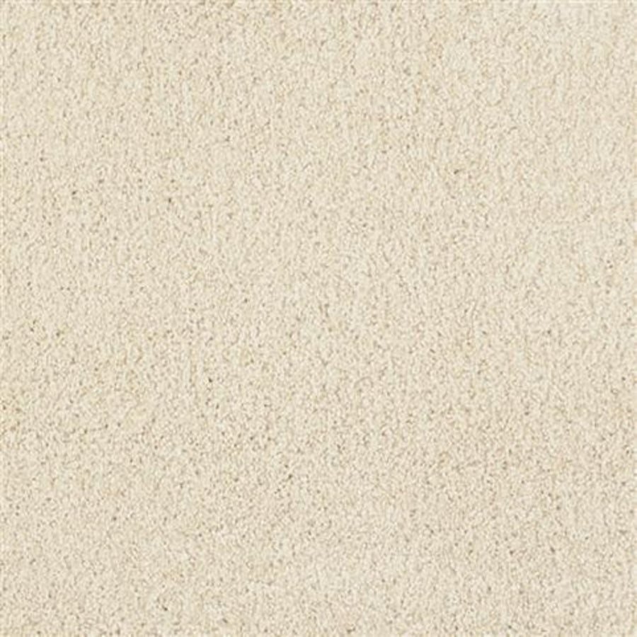 Close-up of Oceanside Family Friendly Carpet in Winds Breath: a soft, light beige carpet with a uniform look. Dense fibers create plush, cozy flooring that’s durable enough for everyday family living.
