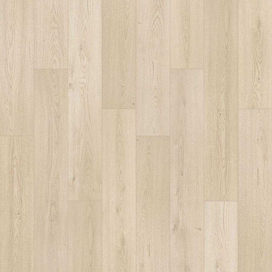 Aurora Falls 7 1/2" Waterproof Laminate in Winter Oak features light wood tones, a natural grain pattern, and subtle color variations. Its moisture-barrier technology adds durability, while clean planks create a modern look in a staggered layout.