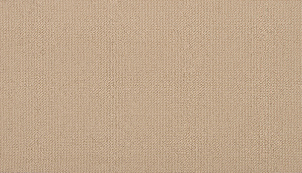 Close-up of Wool Fundamentals On Trend Carpet in Sandstone, showing its beige woven fabric with fine threads and an even, subtle texture—perfect for those seeking a stylish and durable wool carpeting option.