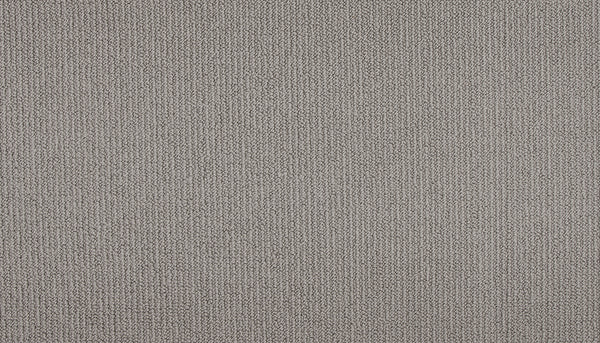 Close-up of Wool Fundamentals On Trend Carpet in Pewter, featuring a light gray hue and a uniform pattern of small, tightly woven threads for a textured weave appearance.