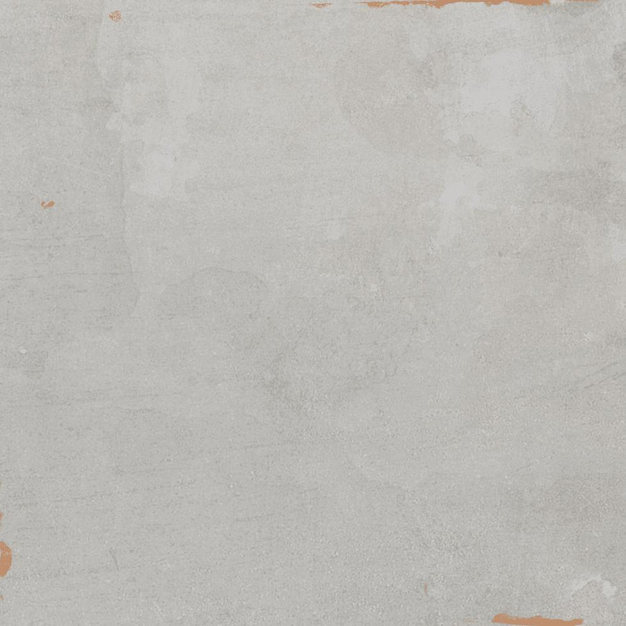 A textured, light gray concrete surface with subtle patches of white and faint orange-brown stains around the edges, creating a weathered, rustic appearance.
