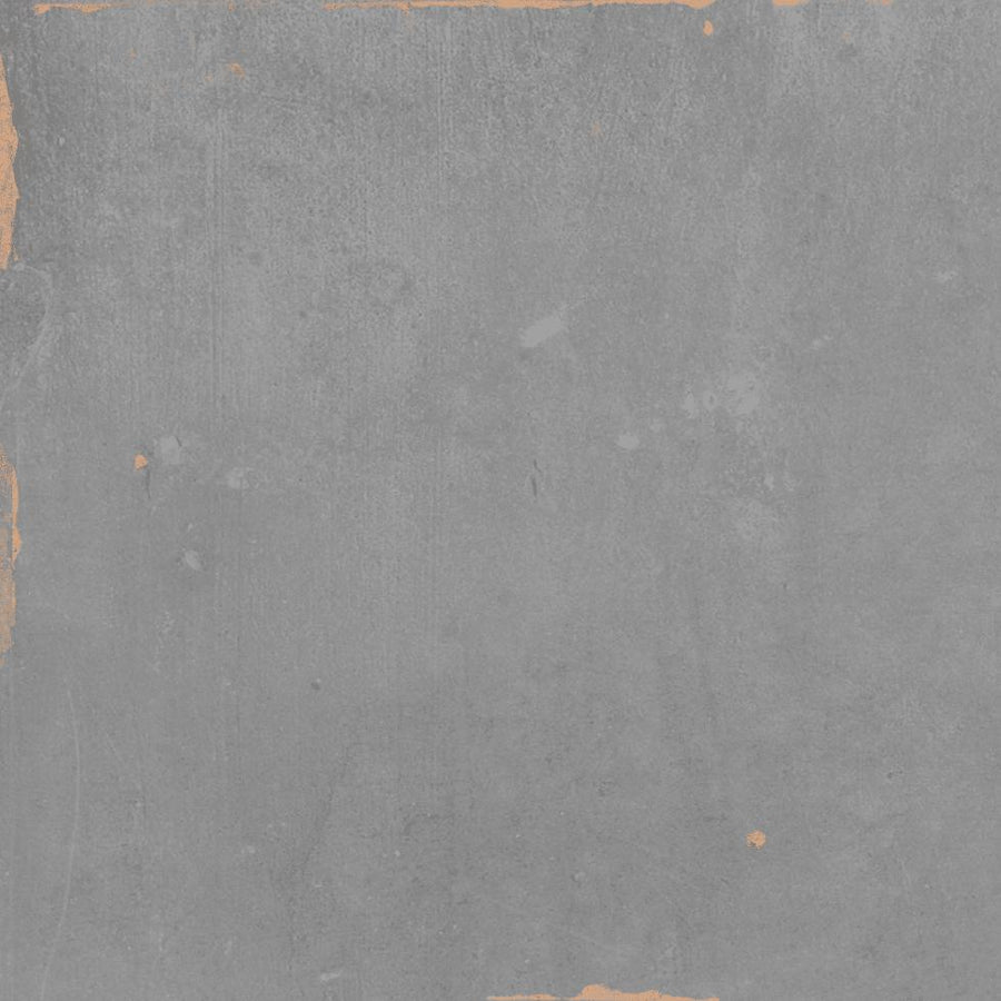 A textured gray concrete wall with rough, uneven surfaces and some chipped edges, particularly along the left side and top, revealing a slightly lighter underlayer.