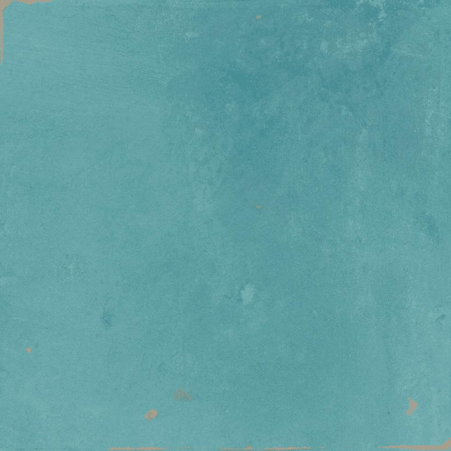 A textured surface painted in a solid, vibrant turquoise color with subtle variations in shading and small patches of exposed material near the edges.