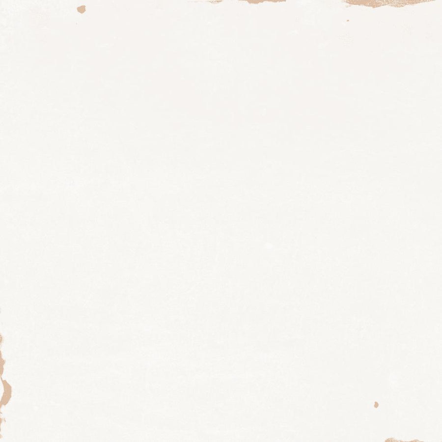 Off-white paper with faint brown stains and worn, uneven edges, resembling vintage or aged parchment. The center area is clear, while the brown discoloration appears mostly along the borders.