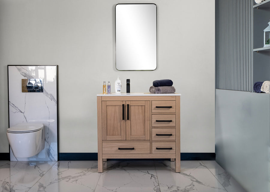 Modern bathroom with the Ashley 36" Vanity in natural oak, topped with a rectangular mirror, toiletries and towels on the counter, a wall-mounted toilet, and elegant marble tile floor and accents.