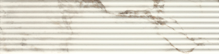 Altissimo 4" x 16" Fluted Ceramic Tile features a white matte, ribbed surface with elegant fluting—ideal for creating a modern accent wall.