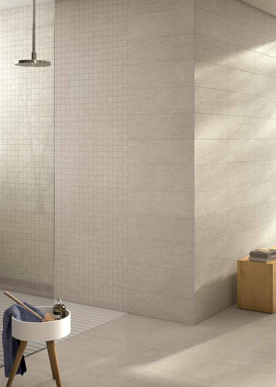 A bathroom with a shower and a sink.