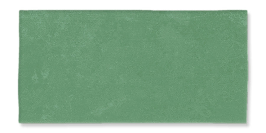 A rectangular tile with a matte, solid sage green color and a slightly textured surface.
