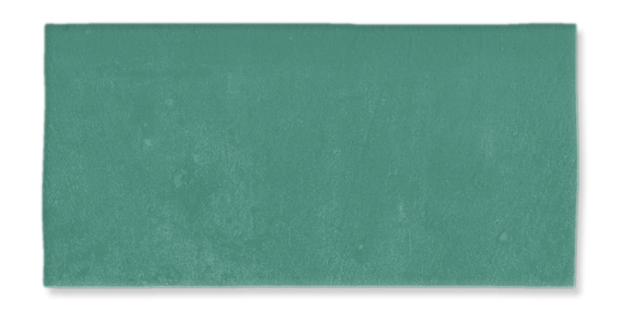 A rectangular, teal-colored tile with a matte finish and slightly textured surface, set against a white background.