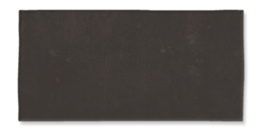 A rectangular, dark brown tile with a smooth, matte finish, shown against a white background.