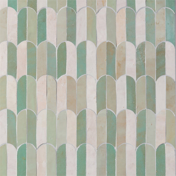 Featuring pastel green, beige, and white arched tiles in a repeating scallop design, the Mistral Bab Mosaic adds artistic elegance and textured geometric charm to any space.