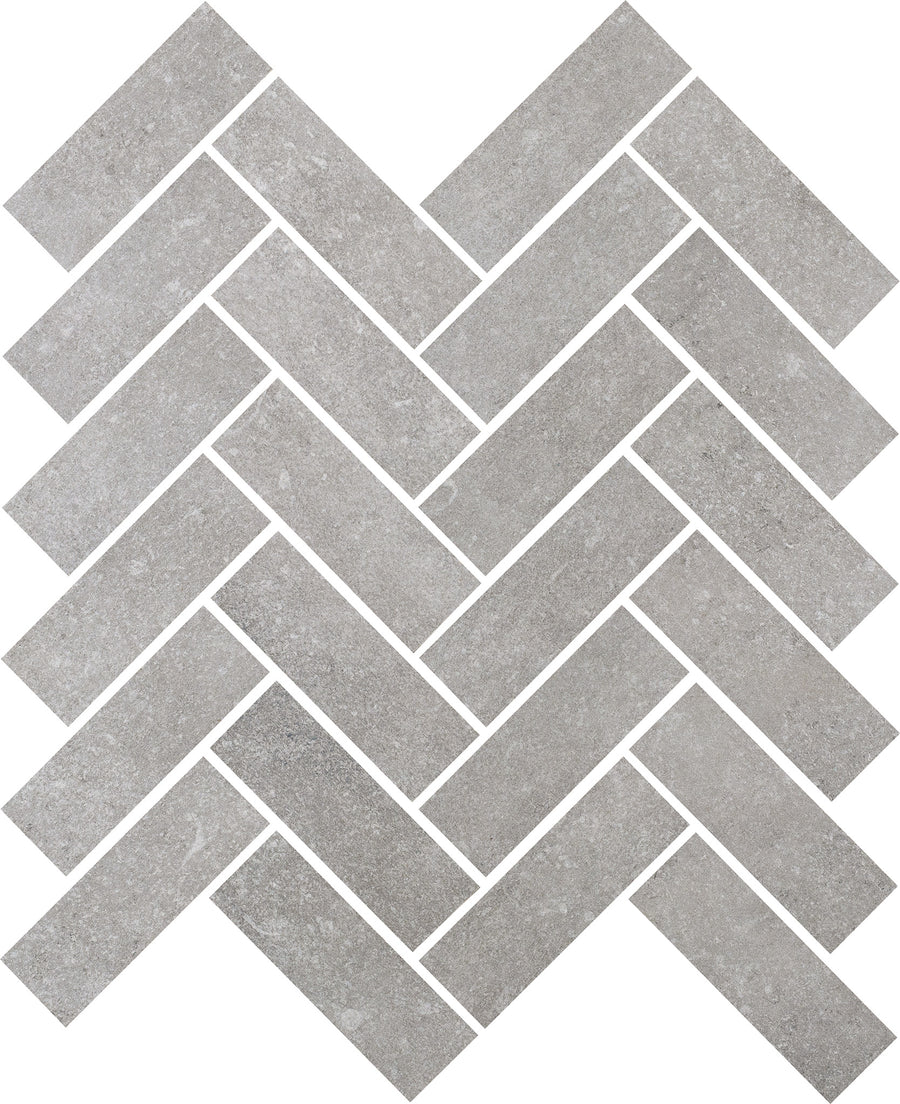Ardennes Herringbone Mosaic Tile in Cliff creates a stunning accent wall with its stone-like texture and sharp white grout lines—perfect for bathrooms seeking a modern, elegant upgrade.