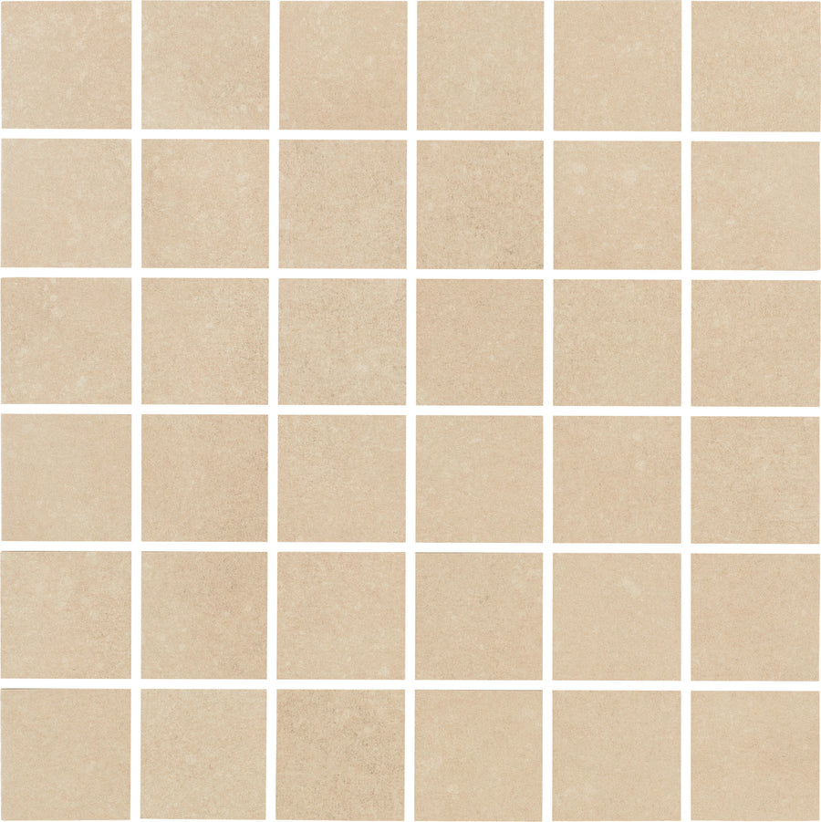 A 12" x 12" Ardennes mosaic tile in Sand, featuring a grid of 36 luxury tiles with subtle color and texture variation, arranged in a 6x6 pattern with thin grout lines for an elegant, refined look.