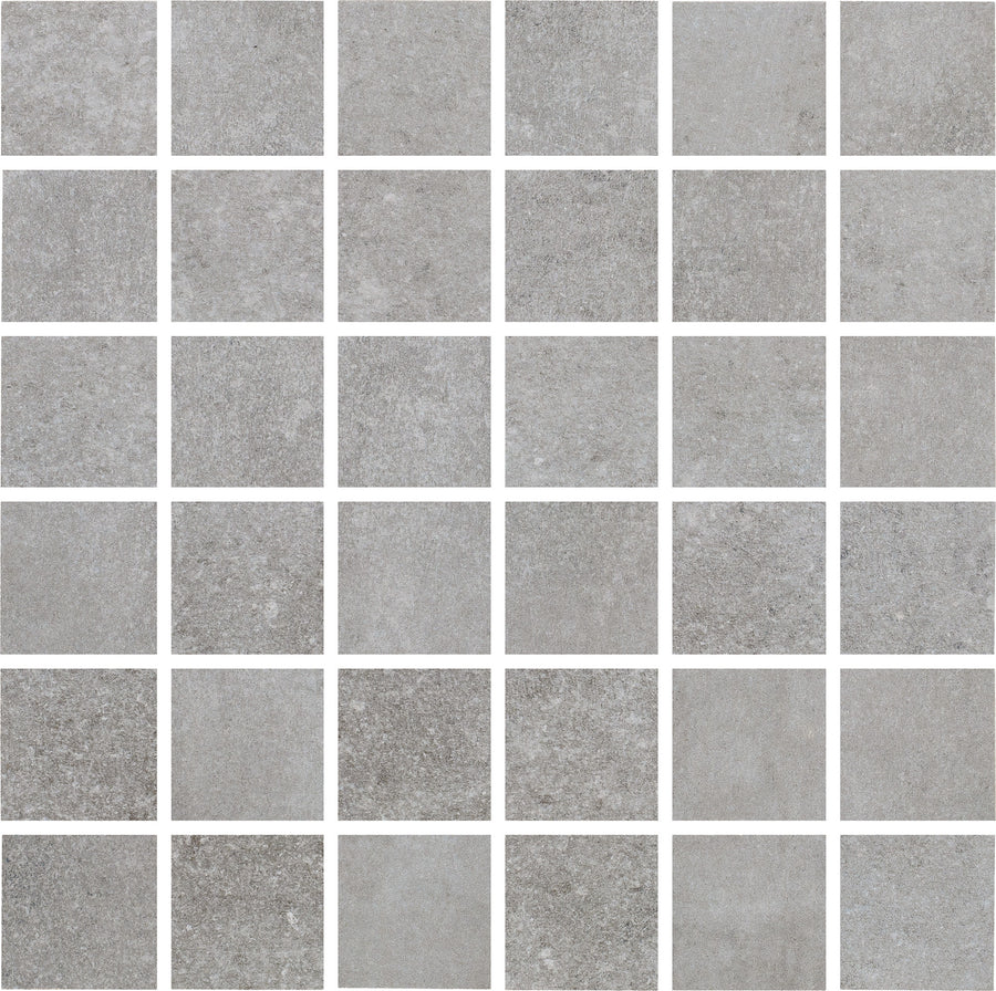 A 6x6 grid of Ardennes 12" x 12" Mosaic Tile in Cliff features evenly spaced square gray tiles with a textured, stone-like surface for an elegant mosaic tile look.