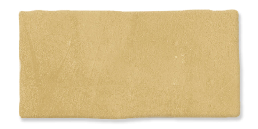 A rectangular sheet of plain, rolled-out dough with a smooth, slightly uneven surface and light beige color, displayed on a white background.