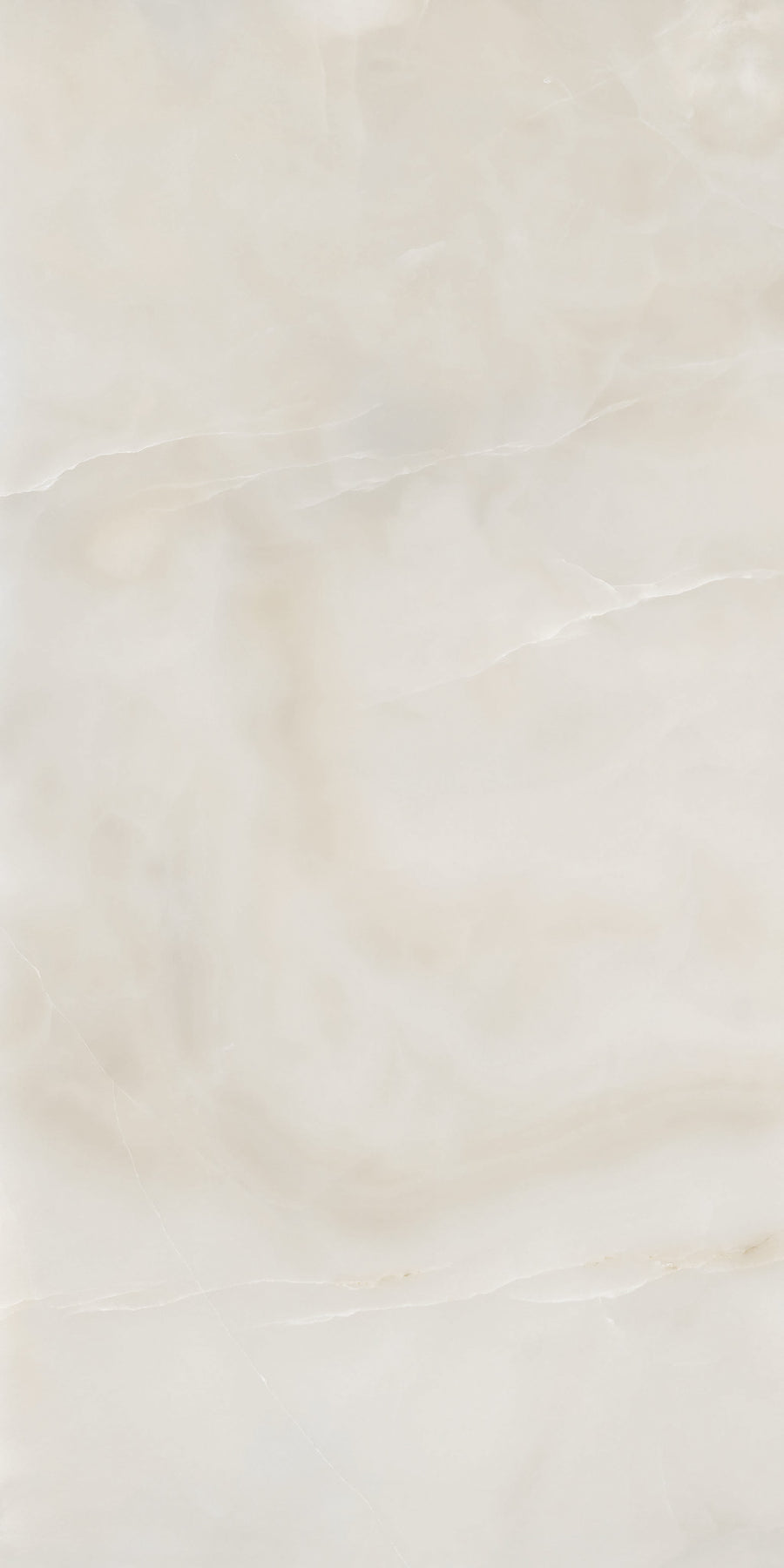 A smooth, light beige marble surface with subtle, wavy veins and soft, cloudy patterns throughout.