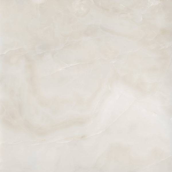 White marble surface with subtle beige and light gray veining, creating a smooth, polished texture and a natural, elegant appearance.