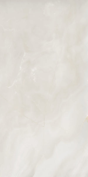 A smooth, light beige marble surface with subtle, cloudy patterns and faint, thin veins running through it. The appearance is polished and glossy, giving a natural, elegant look.