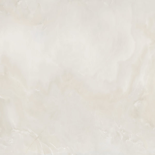 A smooth, light beige marble surface with subtle white and cream veining patterns, giving a soft, elegant, and slightly cloudy appearance.