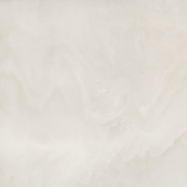 A smooth, light beige marble surface with subtle white and cream swirls and veins, creating a natural, elegant pattern.