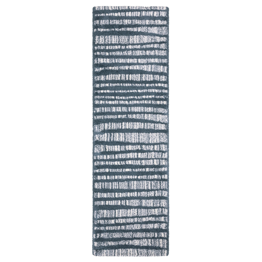 Rectangular runner rug with a dark blue background and irregular horizontal white lines, creating a modern, abstract striped pattern.