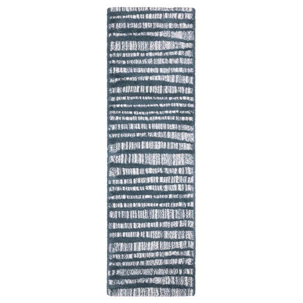 Rectangular runner rug with a dark blue background and irregular horizontal white lines, creating a modern, abstract striped pattern.
