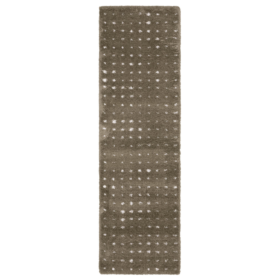 A long, rectangular taupe rug with a pattern of evenly spaced small white dots arranged in a grid.
