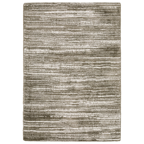 The Galileo 05 Area Rug features horizontal, unevenly spaced stripes in beige, taupe, and light brown tones for a textured, modern look and a soft feel underfoot.