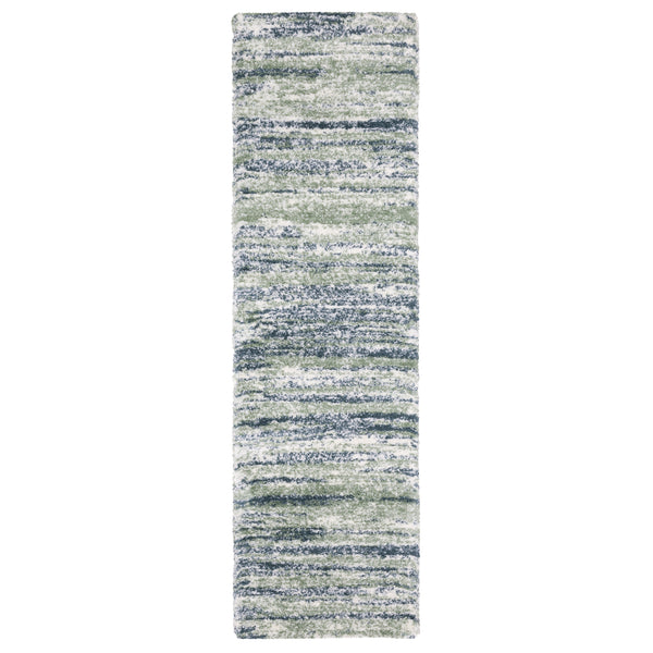 Rectangular area rug runner with a striped pattern in shades of blue, green, and white. The texture appears soft and plush, with irregular horizontal lines creating a modern, abstract look.