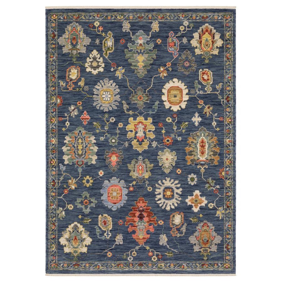 The Lucca 2863B Area Rug features a bold contemporary pattern in blue, bringing modern elegance to any room.