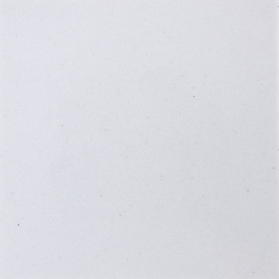 A smooth, light gray surface with tiny specks—perfect for installing the Quad Shower Shelf as a stylish shower organizer or bathroom shelf.