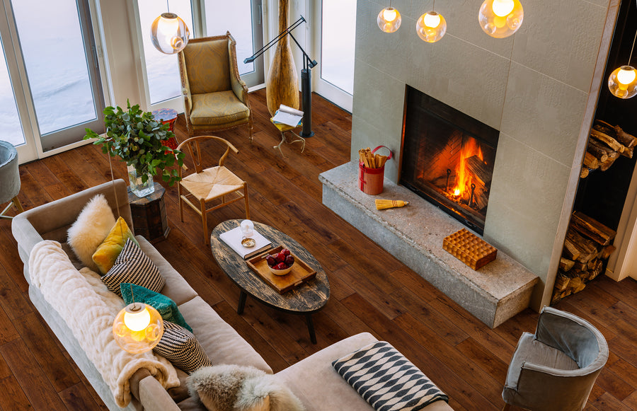 A living room with a fireplace and a couch.