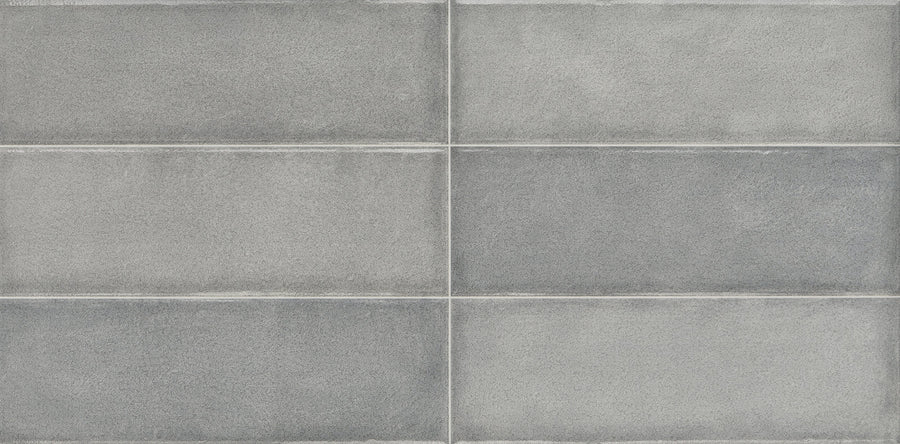 Six Cadence 12" x 24" Framed Tiles in Denim, arranged in two rows of three, feature a subtle texture and white grout lines—an ideal modern wall tile option for contemporary spaces.
