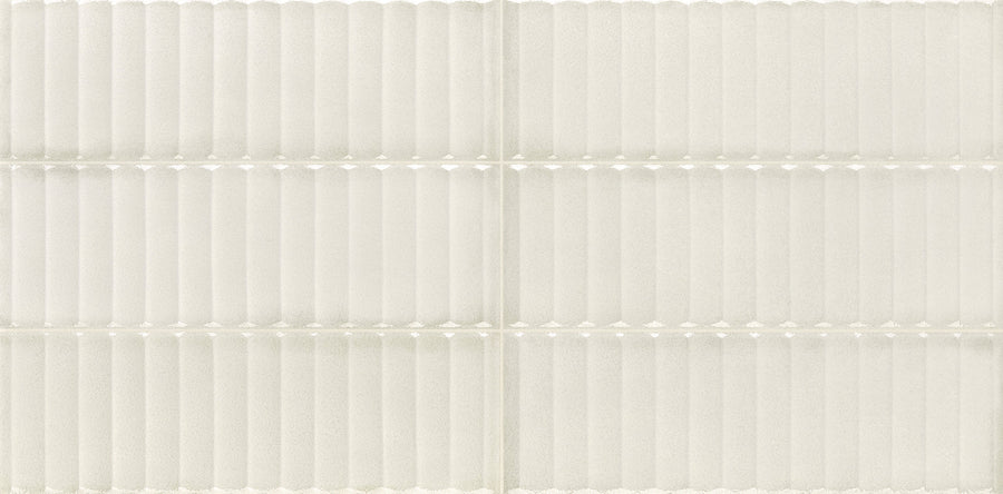 Close-up of the Cadence 12" x 24" Framed Tile in Vista, featuring a grid pattern with six rectangular sections and horizontal ridges for a corrugated, modern look in an off-white/light beige tone.