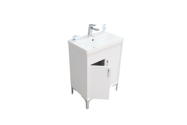 A white sink with a silver faucet.