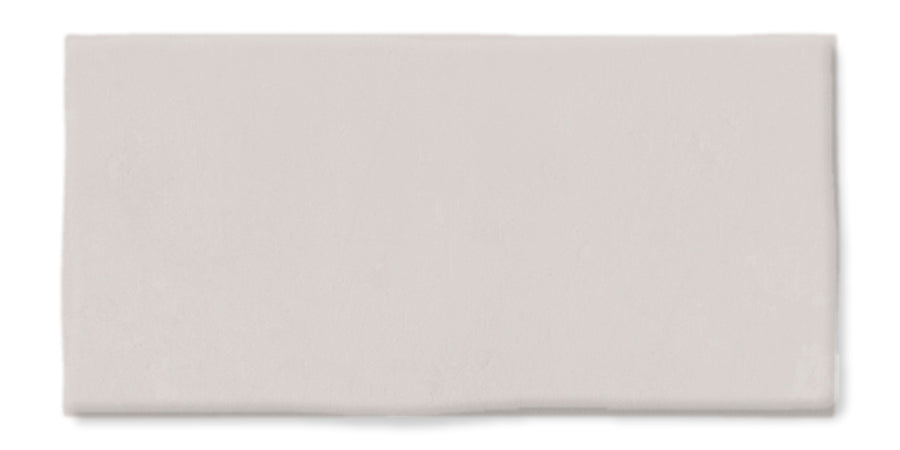 A rectangular, flat, light gray tile with smooth edges and a slightly matte finish, displayed against a white background.