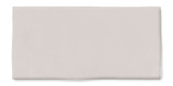 A rectangular, flat, light gray tile with smooth edges and a slightly matte finish, displayed against a white background.