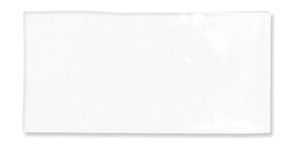 A plain white rectangular napkin is laid flat against a white background, with slight shadows along the edges.