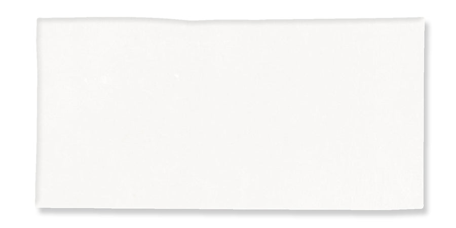 A plain white rectangular napkin, unfolded and laid flat on a white background.