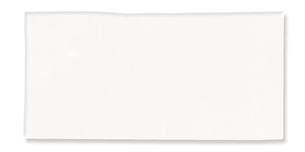A plain white rectangular napkin, unfolded and laid flat on a white background.