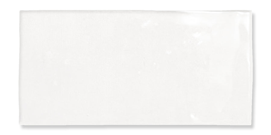 A plain, white rectangular ceramic tile with a glossy finish, photographed against a white background.