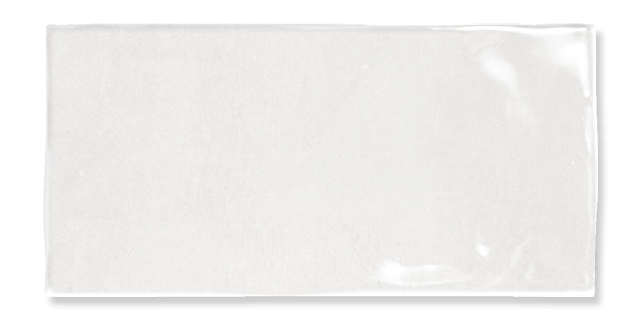 A rectangular white glossy ceramic tile with smooth edges and a slightly uneven, reflective surface.