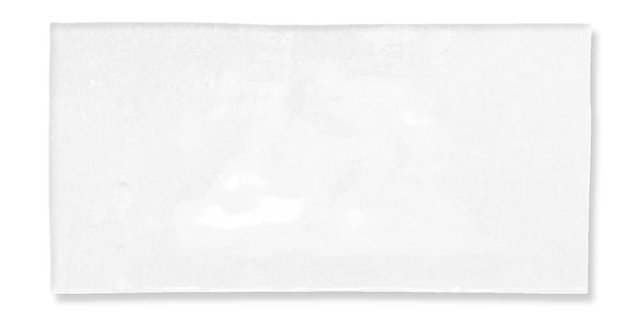 A plain, rectangular white sheet of paper with slightly uneven edges, displayed against a white background.