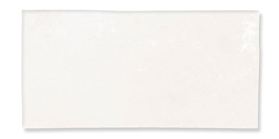 A plain, rectangular sheet of white paper with a subtle texture, photographed against a white background.