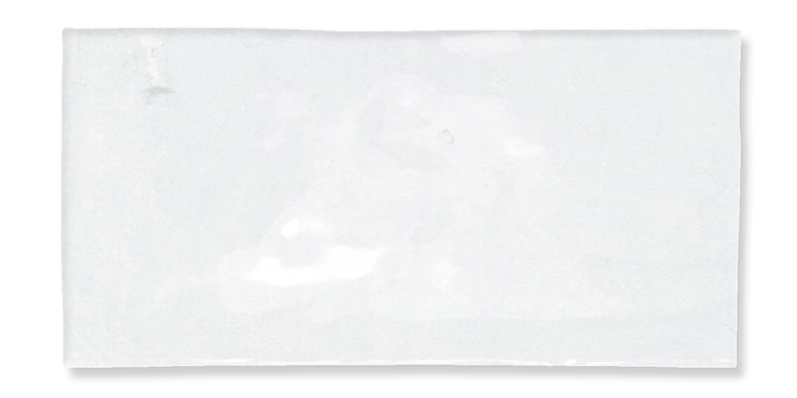 A plain white rectangular napkin or cloth, laid flat with minimal texture and no visible patterns or designs, on a white background.