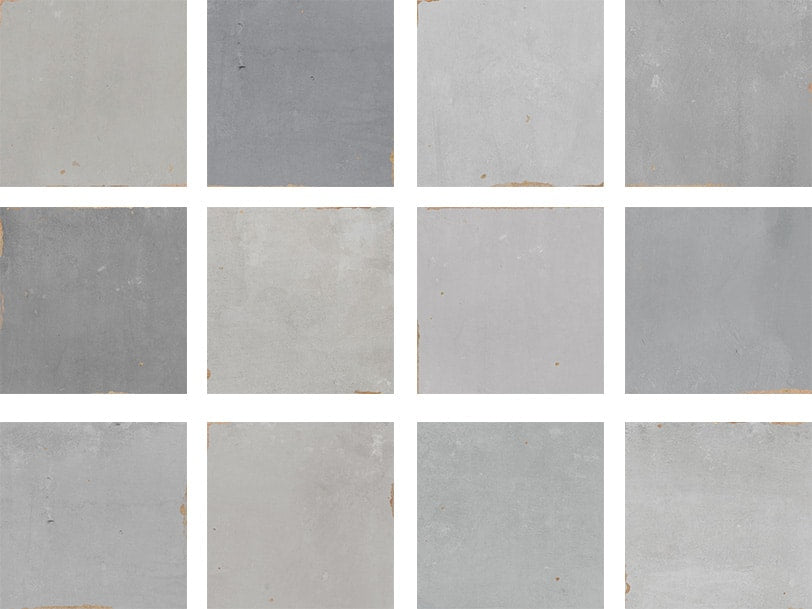 Twelve square tiles in varying shades of gray are arranged in a 3x4 grid, separated by white borders. Each tile shows slight differences in tone and texture, with some having small imperfections or worn edges.