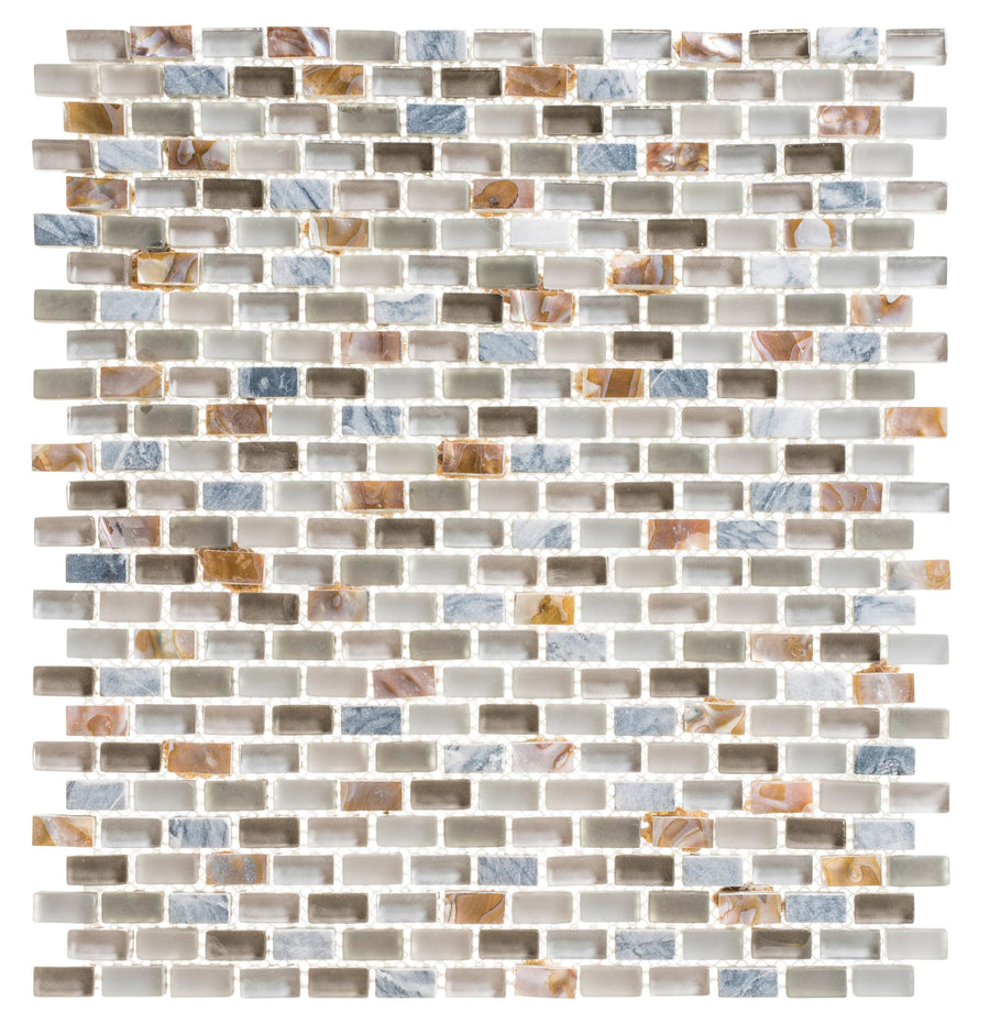 The Americana Glass Mosaic features small glossy glass tiles in white, gray, beige, and amber with marble-like and solid designs, arranged in an offset brick pattern for a stylish neutral accent.