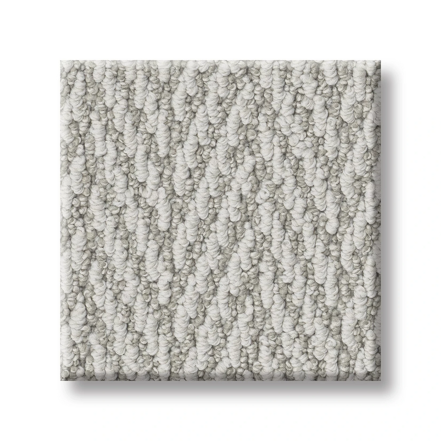 A square swatch of Always Natural On Trend Carpet in light gray loop pile with a subtle herringbone pattern and textured surface, shown against a white background.