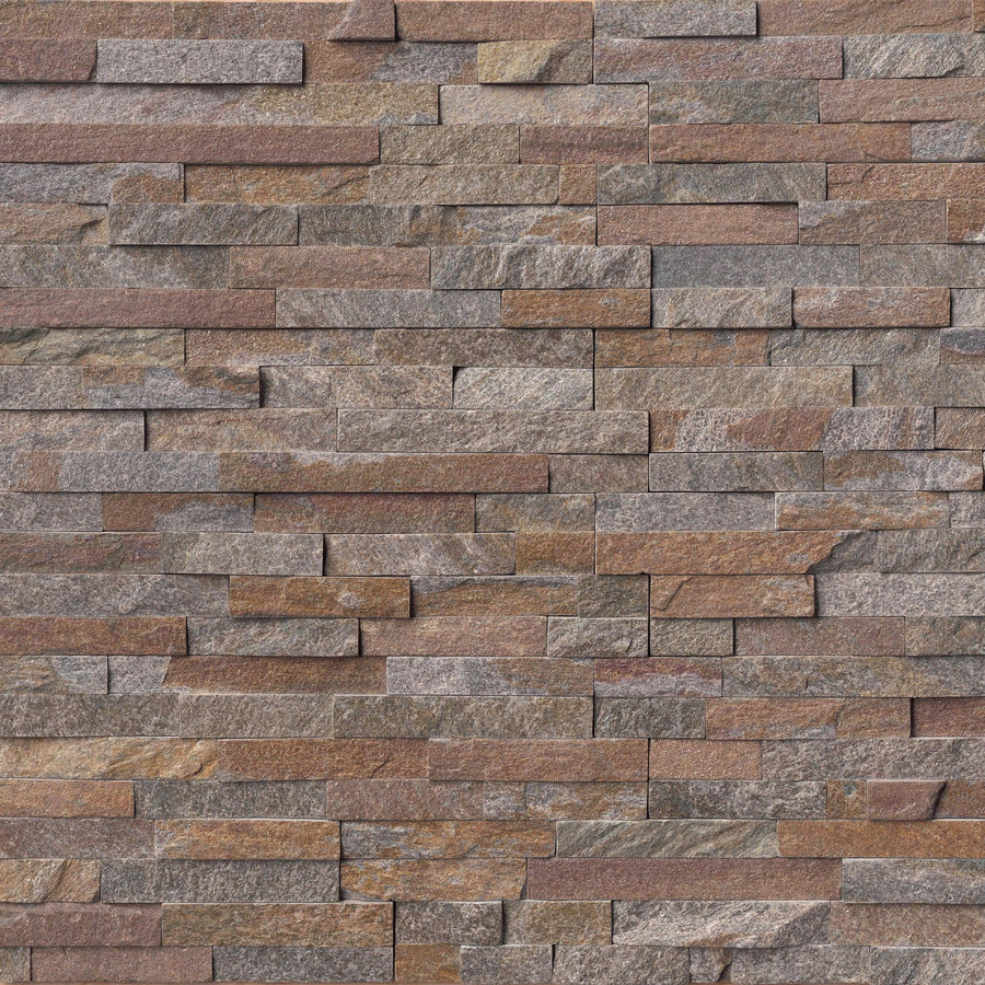 A close-up view of a wall featuring Landscape 6x24 Natural Stone Ledger Panel tiles in stacked, rectangular shapes with brown, gray, and reddish tones, creating a textured and layered design.
